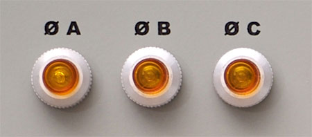 A photo of lamps used to indicate each power phase is powered.